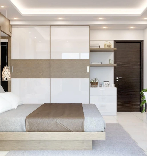 A bedroom featuring a blend of white and brown furniture, creating a stylish and inviting atmosphere.