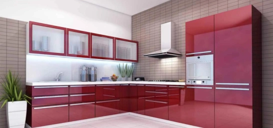kitchen with gray cabinets, a wood-paneled upper cabinet & dining table, pendant light, patterned floor.