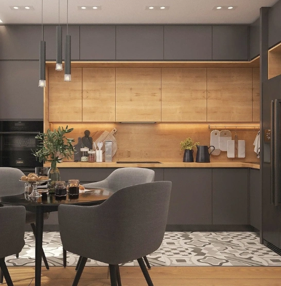 modern L-shaped kitchen with red cabinets, white countertops, glass-fronted upper cabinet, chimney hood.