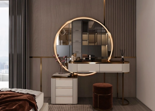 Bedroom with a curved vanity table & a large circular mirror with LED lighting drawers &  matching stool