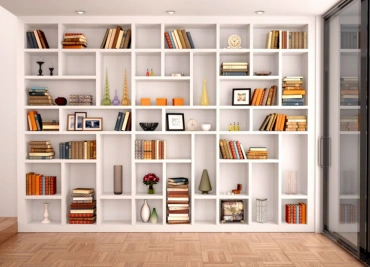 A large white bookcase filled with numerous books reflecting a space-saving design for modern living