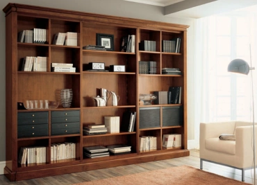 A large bookcase filled with more books & decorative items, reflecting modern, space-saving design.
