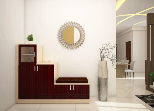 A stylish foyer with an elegance mirror and an aesthetic cabinet, reflecting modern interior design